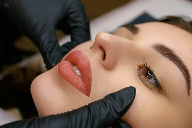 Finished work on permanent lip makeup for a model lips close up